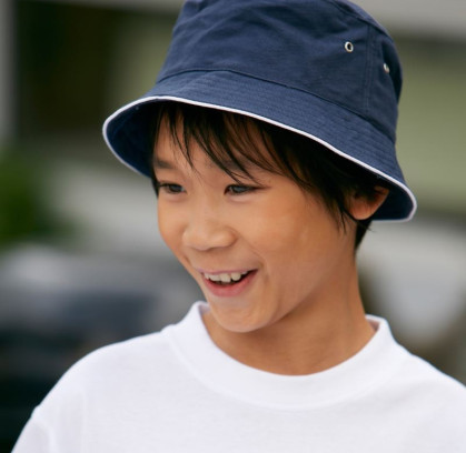 Kepurės vaikams: kaip išrinkti tinkamą galvos apdangalą mažyliui?